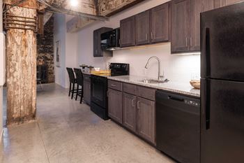 Model kitchen with black appliances 